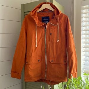 Orange canvas jacket size small fits like a medium.